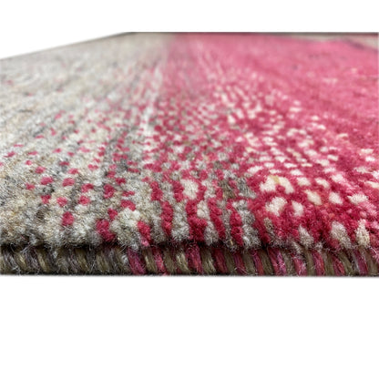 Gabbeh rug edge with fringes: pink-gray pattern and woven texture