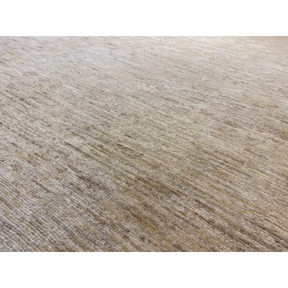 Close-up of the Gabbeh rug: light beige texture with fine, low-contrast lines