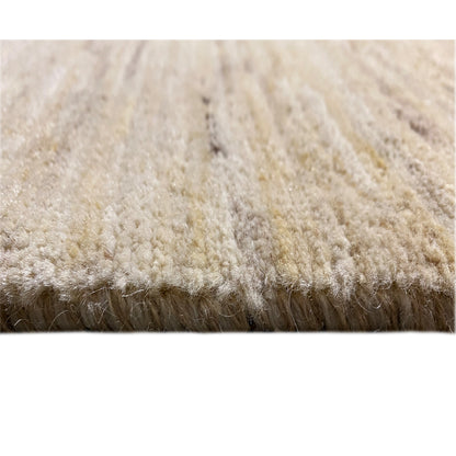 Gabbeh rug close-up of the pile height in light beige, with a dense, soft surface