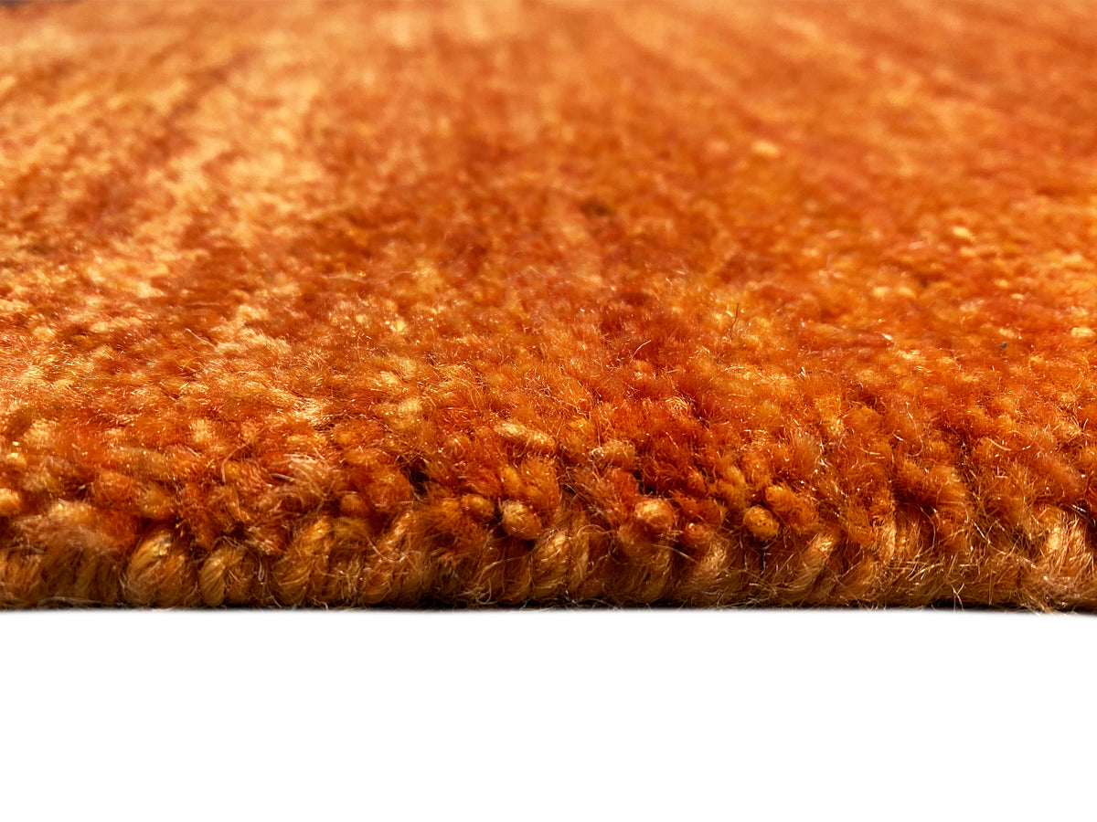 Gabbeh-Teppich 230x172 cm Detail der Florhöhe in kräftigem Orange