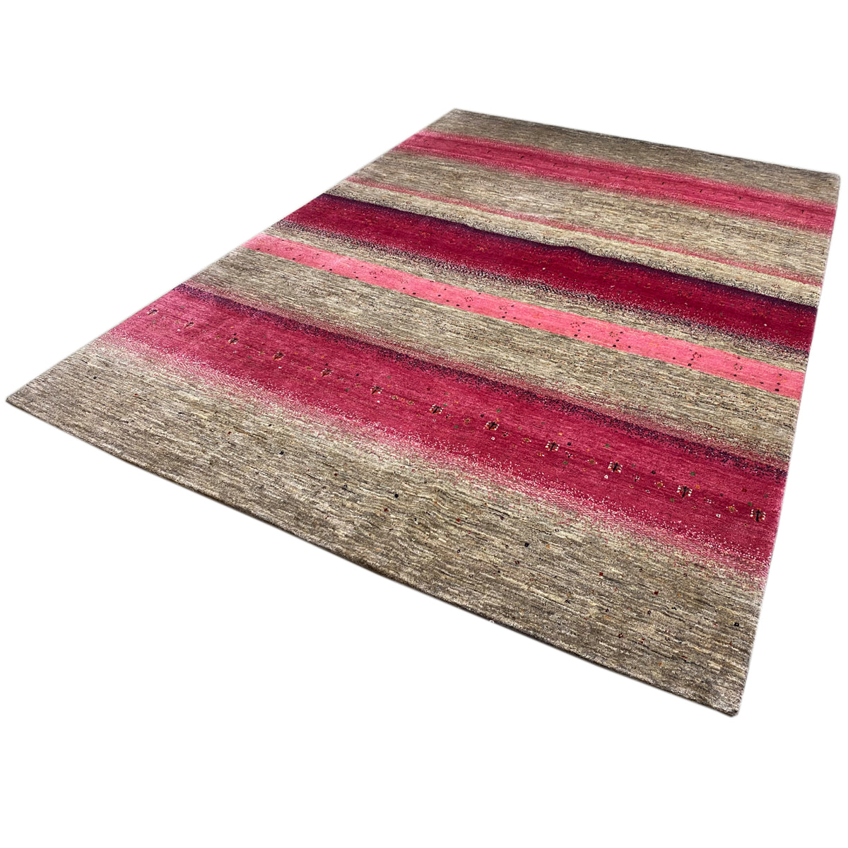 Gabbeh rug spread out: striped pattern in pink and gray