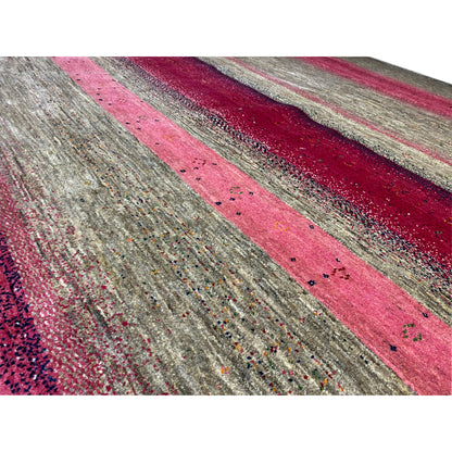 Gabbeh rug detail view: dotted stripe pattern in pink and gray