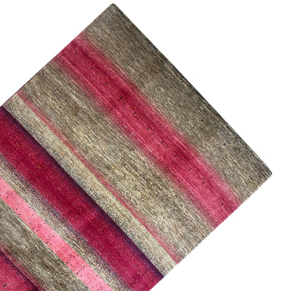 Gabbeh rug detail: narrow and wide stripes in pink and gray