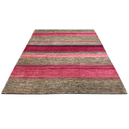 Gabbeh rug with diagonal perspective: striped pattern in pink and gray