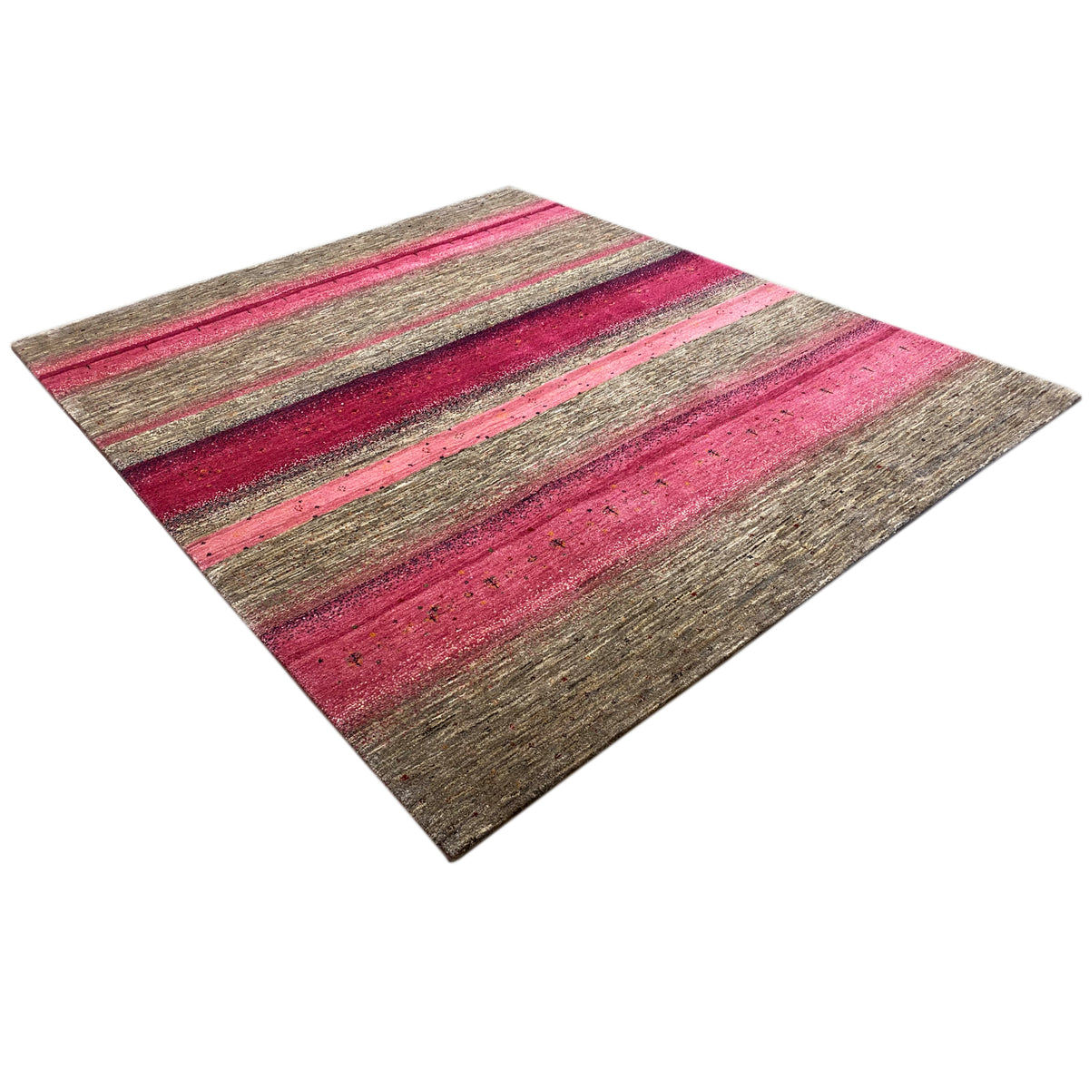 Gabbeh rug, view from the corner: wide stripes in pink and gray-brown