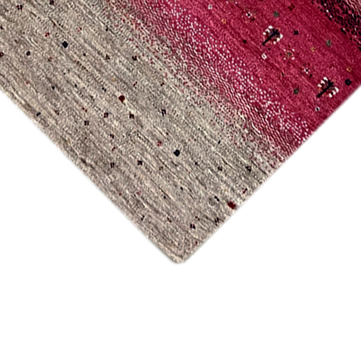 Corner of the Gabbeh runner rug with beige pile and burgundy striped section