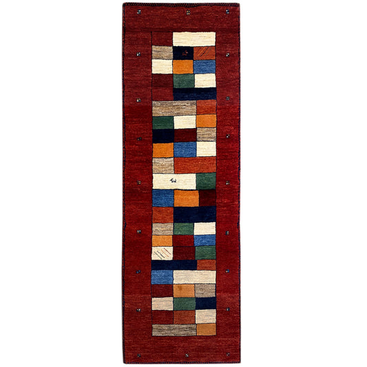 Gabbeh runner rug with a red field and multicolored square pattern
