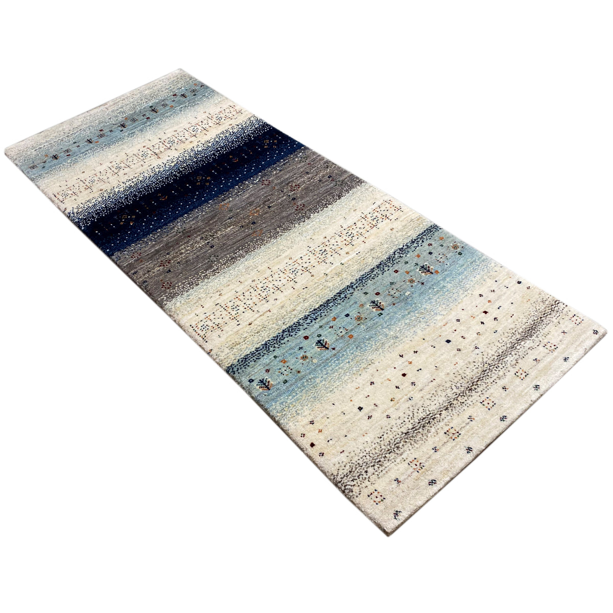 Gabbeh runner rug, diagonal view: light stripes in blue, gray, and dark blue