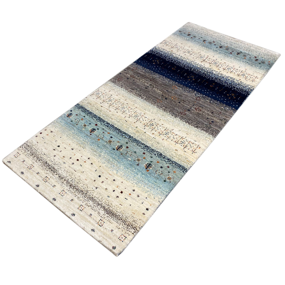 Gabbeh rug runner in an angled perspective with contrasting blue and gray stripes