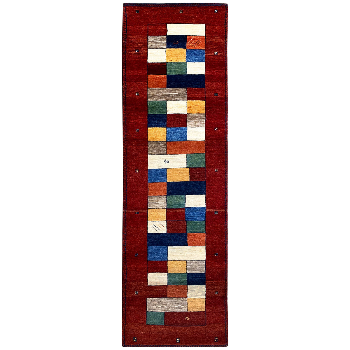 Red Gabbeh rug runner with a geometric block pattern, rectangular.