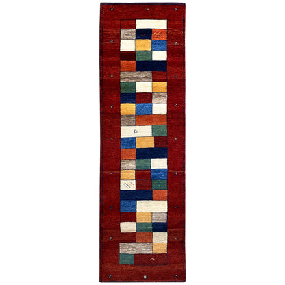 Red Gabbeh rug runner with a geometric block pattern, rectangular.