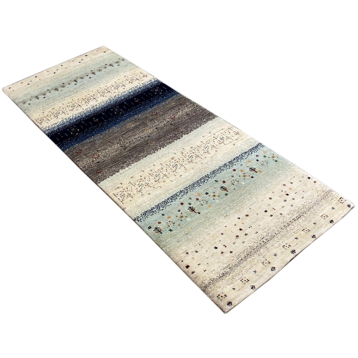 Gabbeh runner rug in an angled view, with color bands and fine patterns