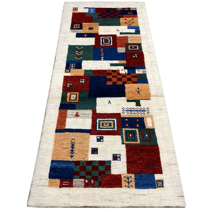 Gabbeh rug, long and narrow: geometric patterns in blue, red, green, and beige