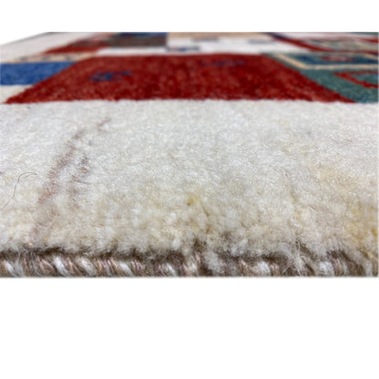 Gabbeh rug, detail of the pile surface with multicolored elements and border