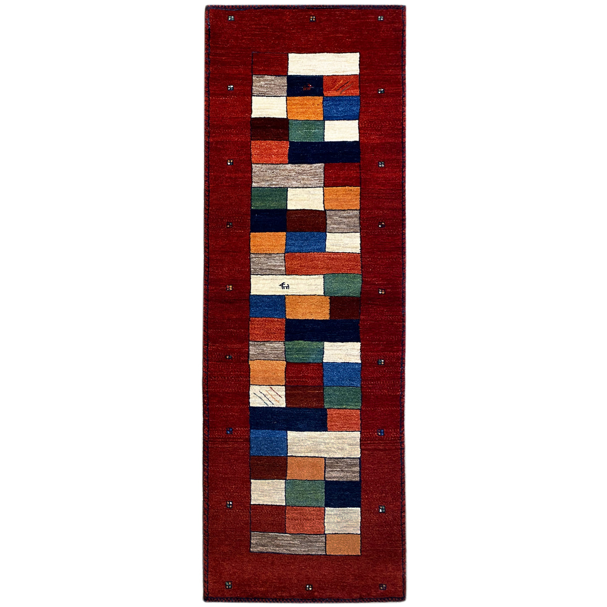 Red Gabbeh runner rug with a geometric patchwork pattern in multicolored blocks and a border