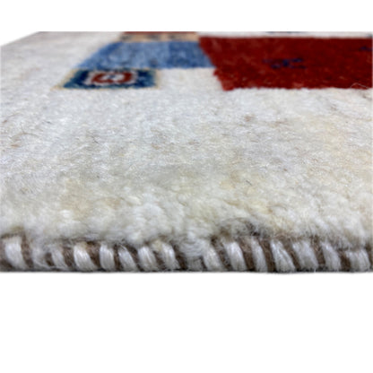 Gabbeh rug with fringed edge and fine woven texture, multicolored