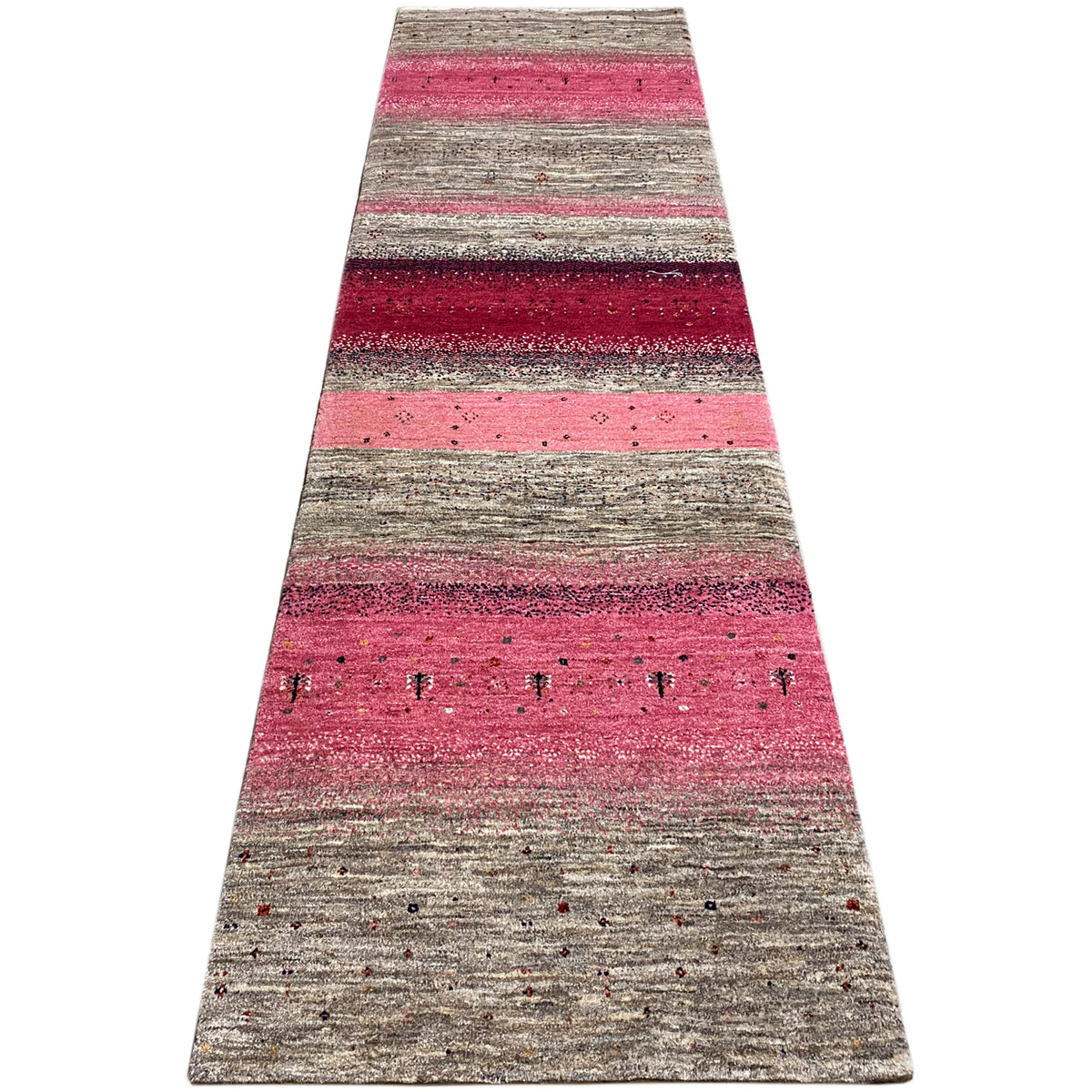 Gabbeh runner rug with lengthwise stripes in pink, gray, and dark red.