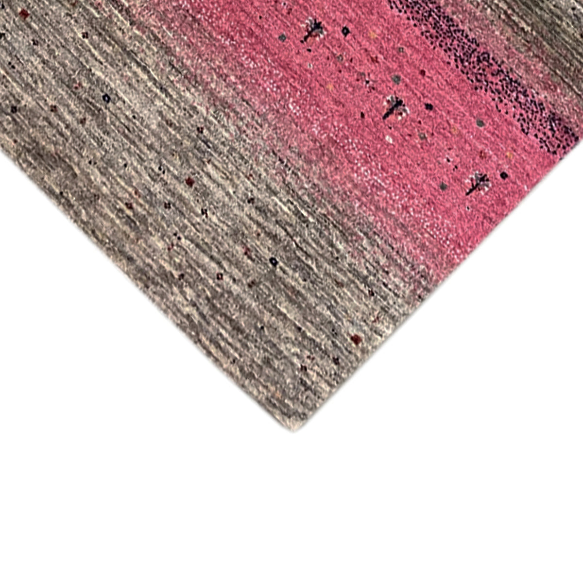 Gabbeh rug runner edge view with textured gray and pink stripes.