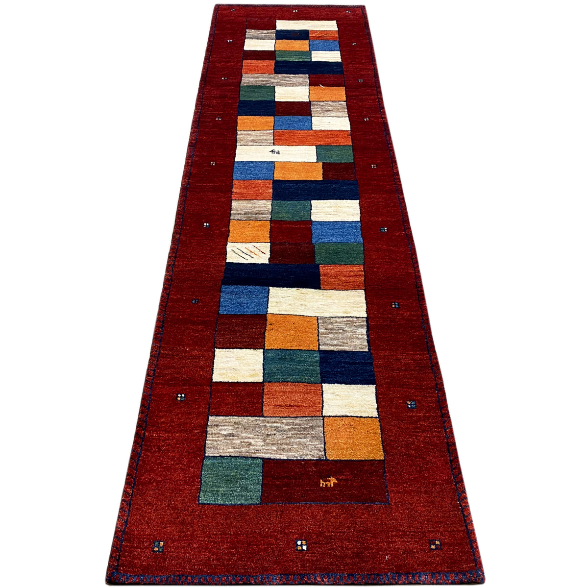 Long gabbeh runner: red background with geometric squares in blue, green, and orange