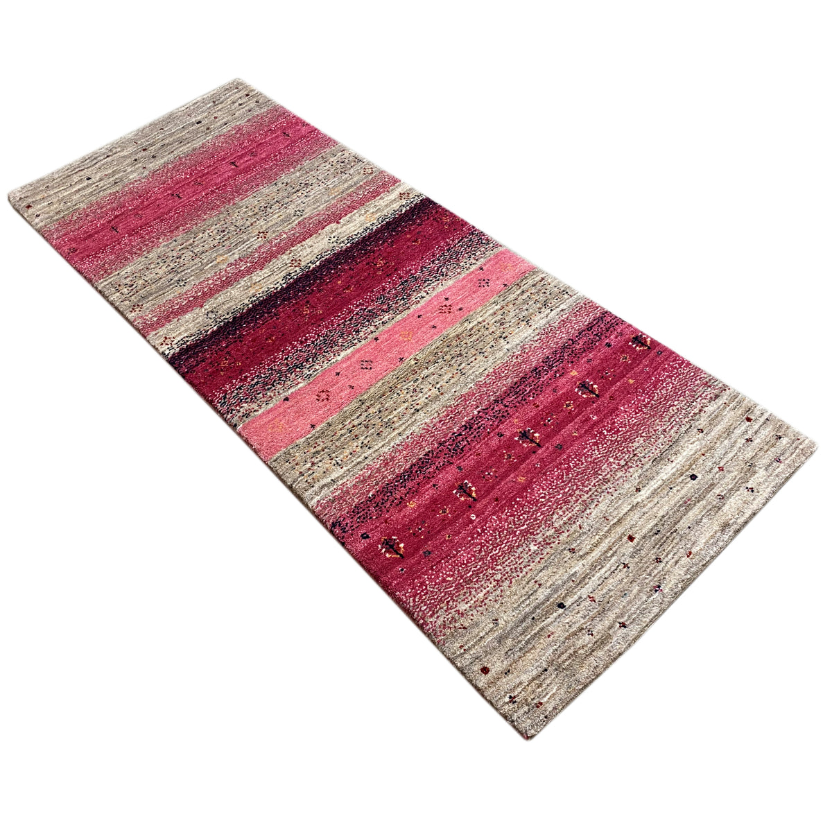 Gabbeh runner rug, laid diagonally, in red and beige tones with fine dots