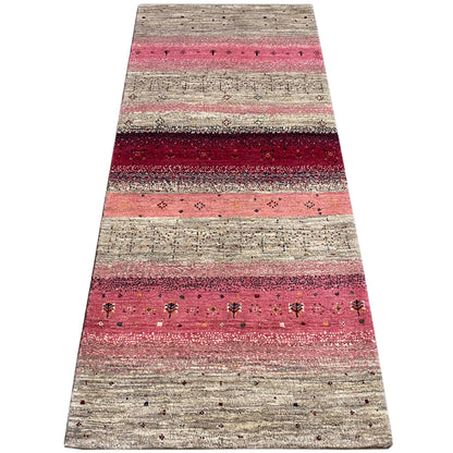 Narrow Gabbeh runner with wide beige and pink stripes and dark dots