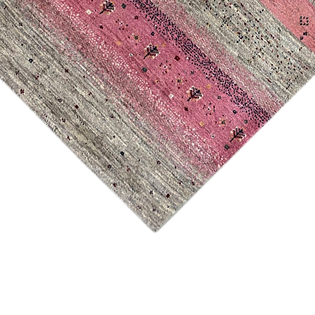 Close-up: pink center band with a sparkling effect, beige striped background and dots