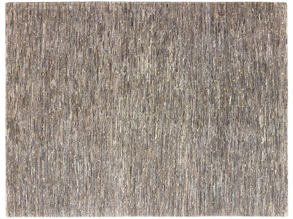 Rug with a rectangular shape and an even, mottled pile texture in gray/beige.