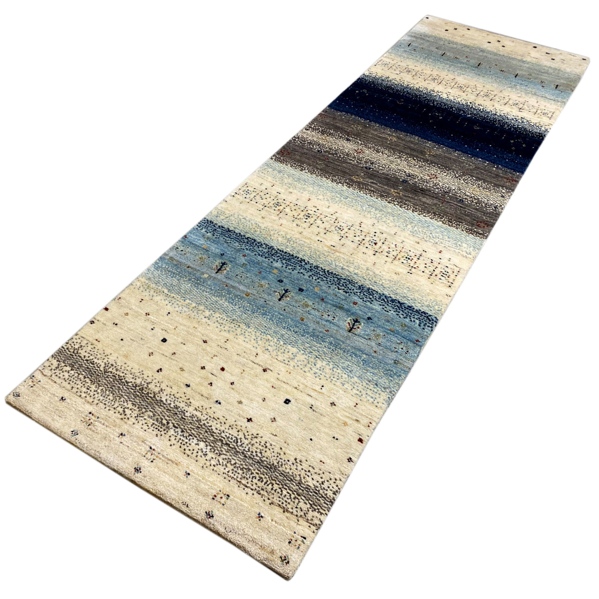 Gabbeh runner rug with diagonal banded color fields in cream, blue, and dark blue