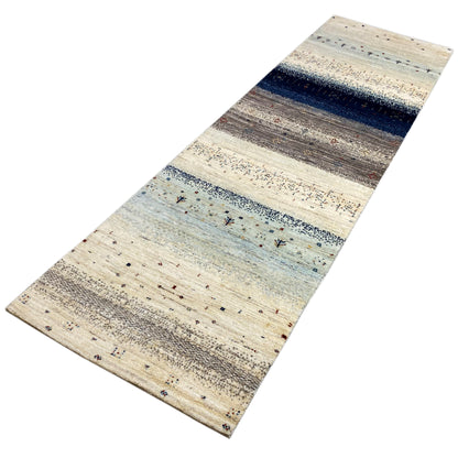 Gabbeh runner rug, diagonal: beige background with light blue areas and a dark stripe