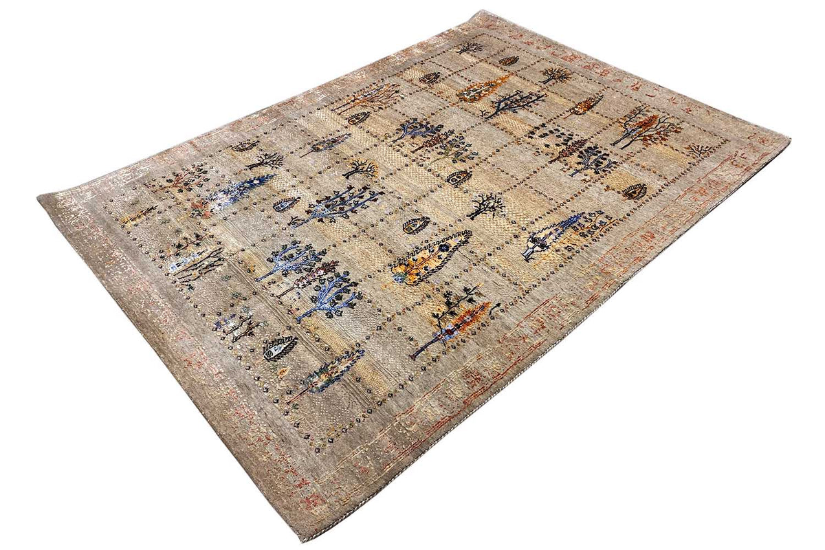 Beige oriental rug with a blue ornamental pattern and fine decorative lines