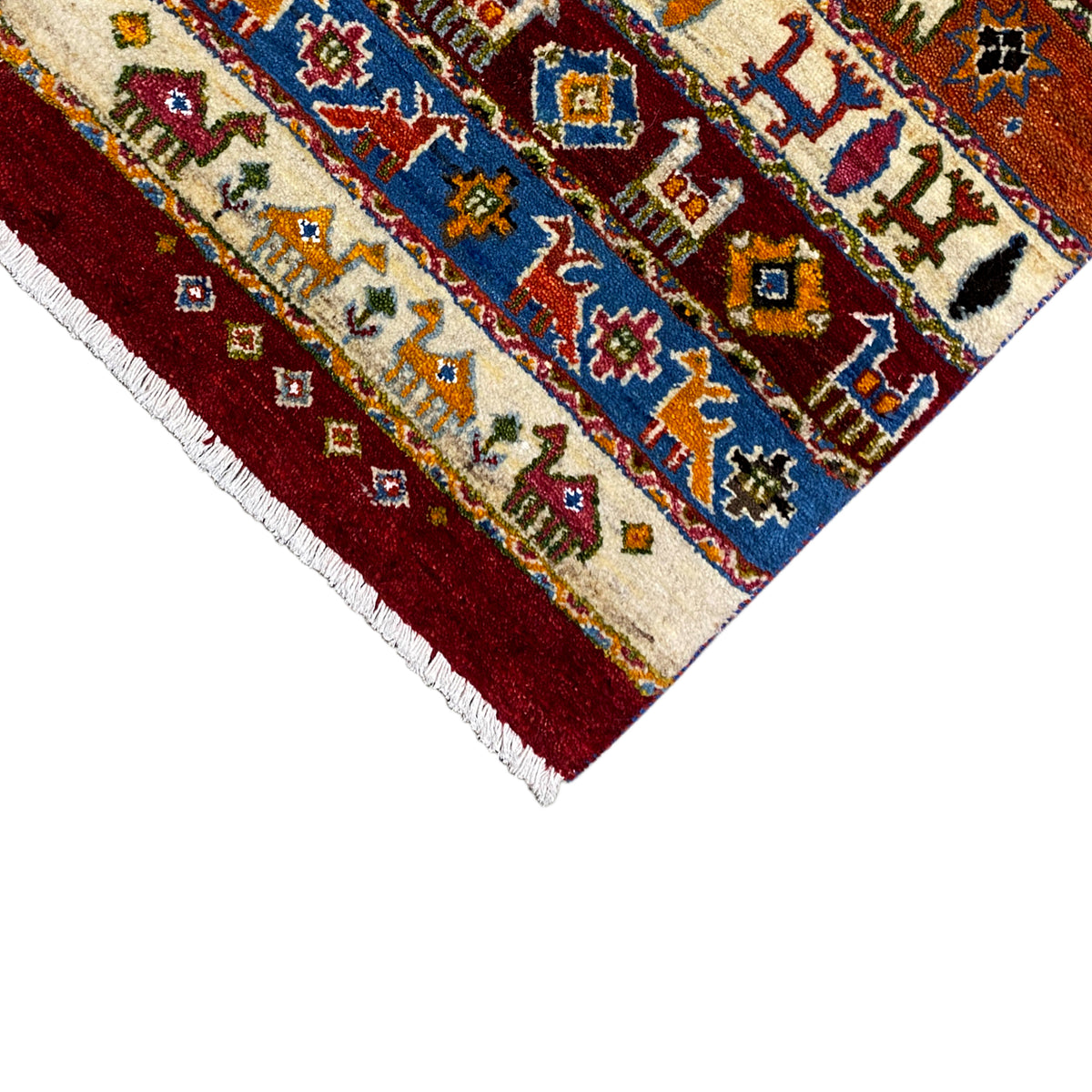 Section of the carpet with a burgundy border, cream-colored background, and colorful figures