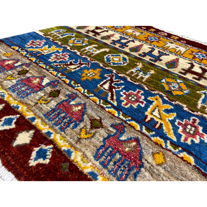 Gabbeh Lori rug 65×56 cm, detail view: densely woven wool with colorful figures