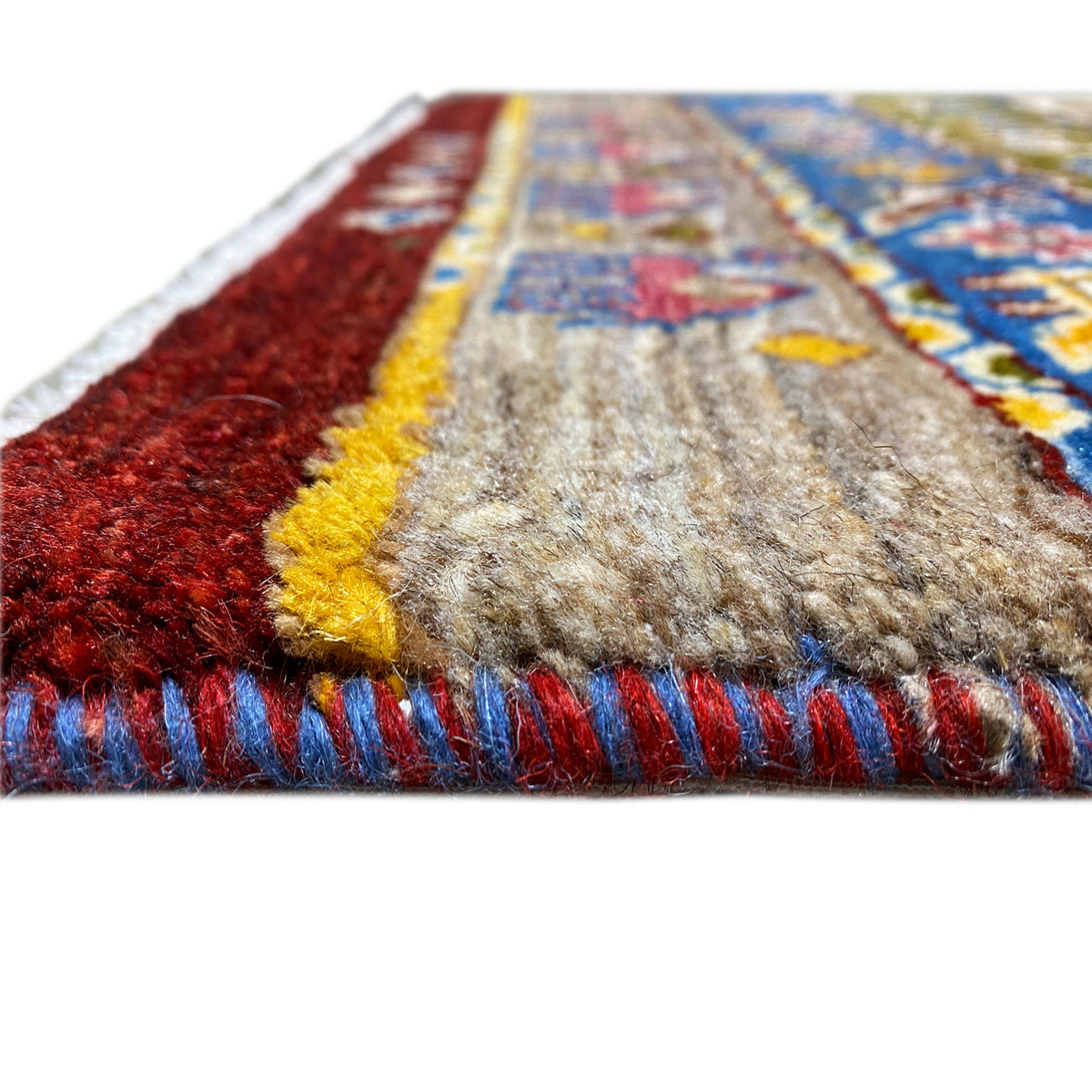 Gabbeh rug Lori 65×56 cm, close-up of edge fringes in red, blue, and yellow