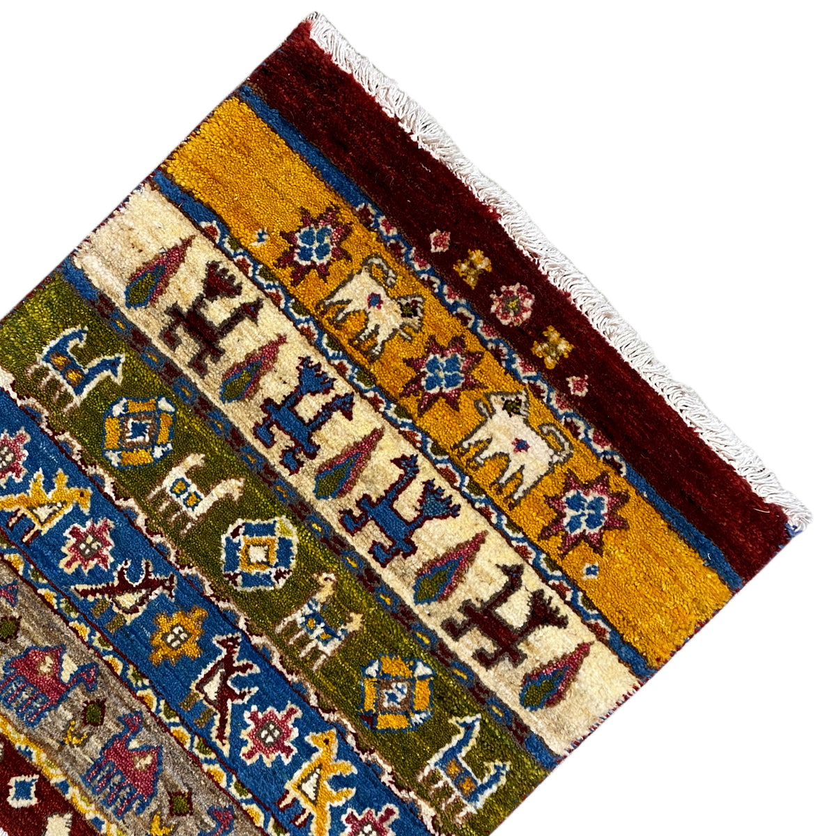 Gabbeh rug Lori 65×56 cm, corner view with borders, yellow-red-blue geometric mix