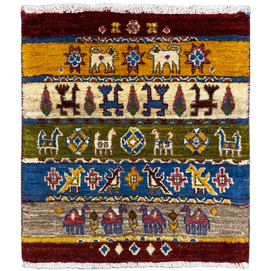 Gabbeh rug Lori 65×56 cm, patterned stripes with elephant motifs, red/yellow/blue