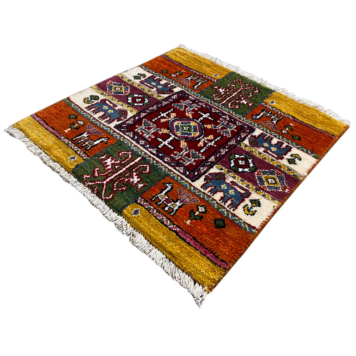 Colorful Gabbeh rug with a square medallion, green and red accents, and fringe