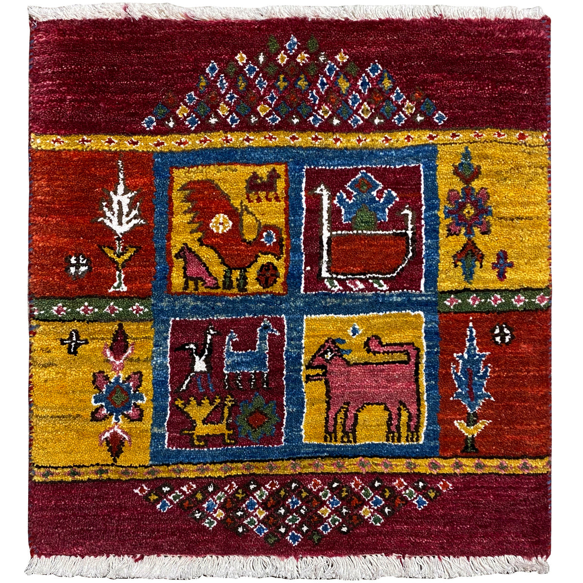 Gabbeh rug with a colorful medallion pattern, burgundy and yellow, fringes