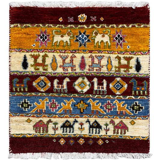 Gabbeh rug 63x58 cm with geometric pattern and fringes, reddish brown & blue.
