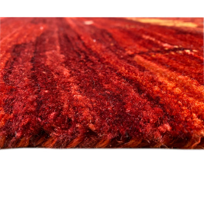 Carpet detail with dense red pile and an even texture, close-up
