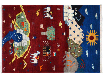 Gabbeh Luri rug with a red and blue pattern, sun, animals, and ornaments