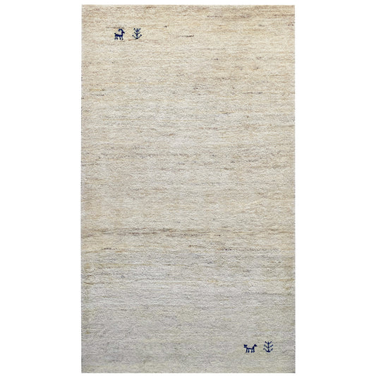 Rectangular Gabbeh rug with a light beige background and small dark blue animal motifs