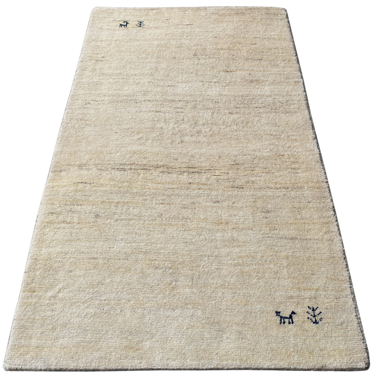 Gabbeh rug (132x70 cm), fully covered, with a light beige pile featuring subtle textures and motifs