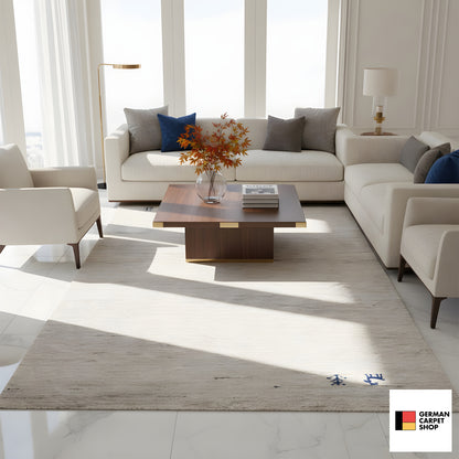 Gabbeh rug (132x70 cm) in the living room, rectangular with a beige pile and dark embroidery