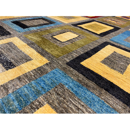 Rug detail with bold stripes and squares in gray, blue, yellow, and black