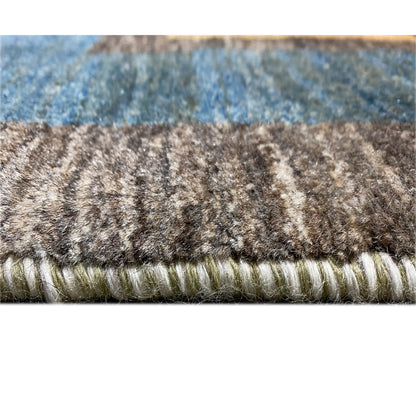 Rug edge with short pile and fringe, multicolored threads on a gray background
