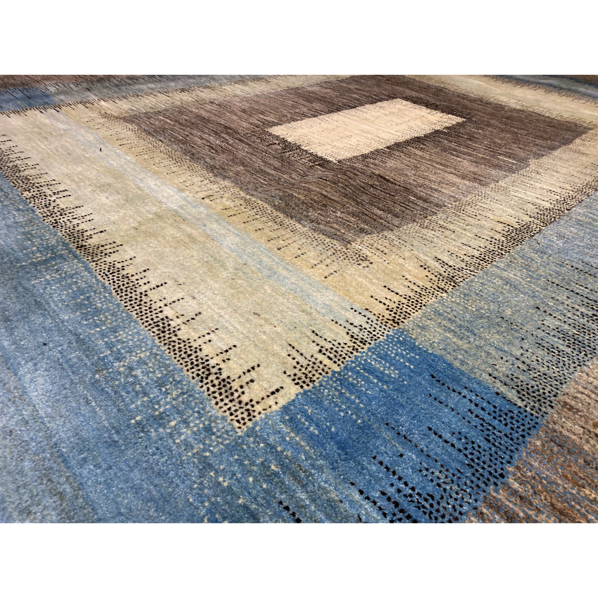 Close-up: Gabbeh rug with a blue field, dot-and-line pattern