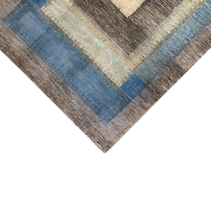 Gabbeh rug corner with linear patterns in brown, blue and beige