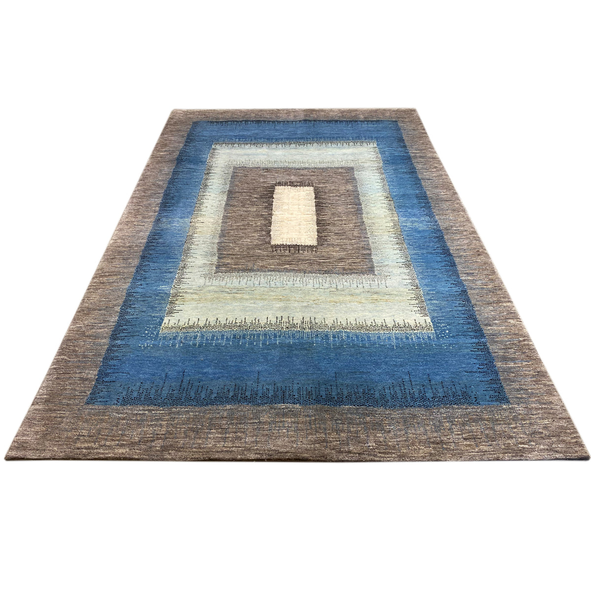 Gabbeh rug, flat-woven rectangular pattern in blue and brown with a cream-colored center