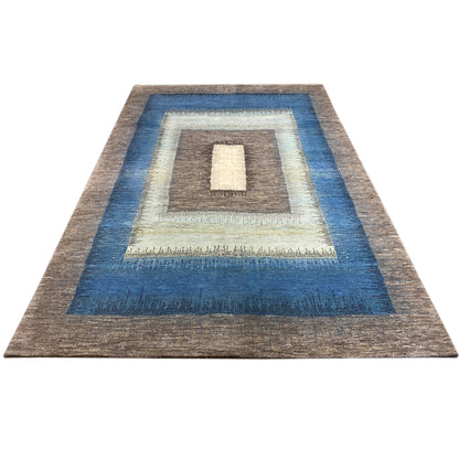 Gabbeh rug, flat-woven rectangular pattern in blue and brown with a cream-colored center