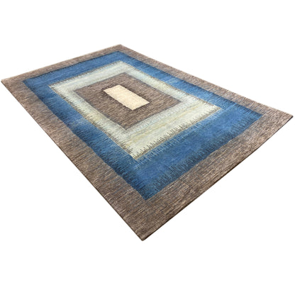 Gabbeh rug in diagonal section, blue border motif around brown square center